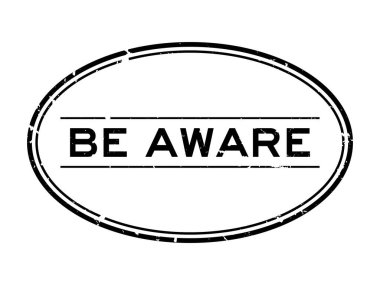 Grunge black be aware word oval rubber seal stamp on white background