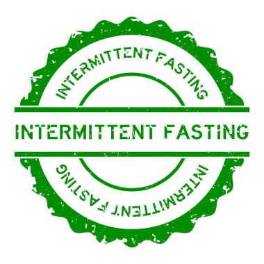 Grunge green intermittent fasting word round rubber seal stamp on white background