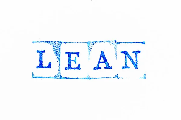 Blue Color Ink Rubber Stamp Word Lean White Paper Background — Stockfoto