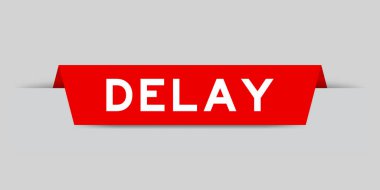 Red color inserted label with word delay on gray background