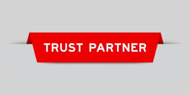 Red color inserted label with word trust partner on gray background