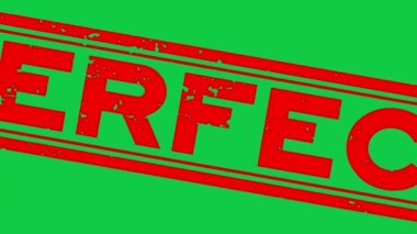 Grunge kırmızı kelime mükemmel kare lastik mühür yeşil arka planda yakınlaştır