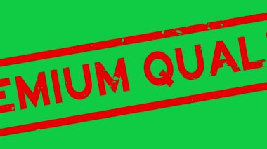 Grunge kırmızı premium kalite kelime kare kauçuk mühür yeşil arka planda yakınlaştırma