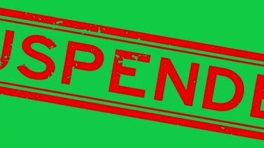 Grunge red suspended word square rubber seal stamp zoom on green background
