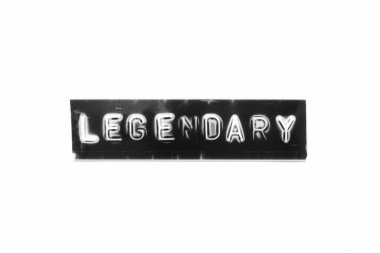 Embossed letter with word legendary in black banner on white paper background