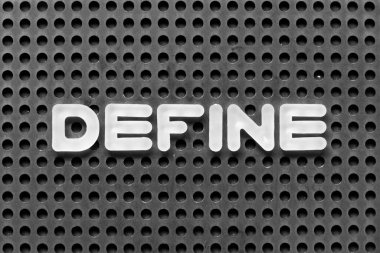 White alphabet letter in word define on black pegboard background