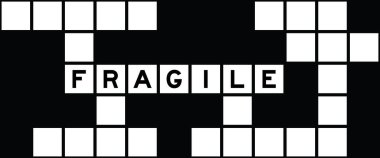 Alphabet letter in word fragile on crossword puzzle background