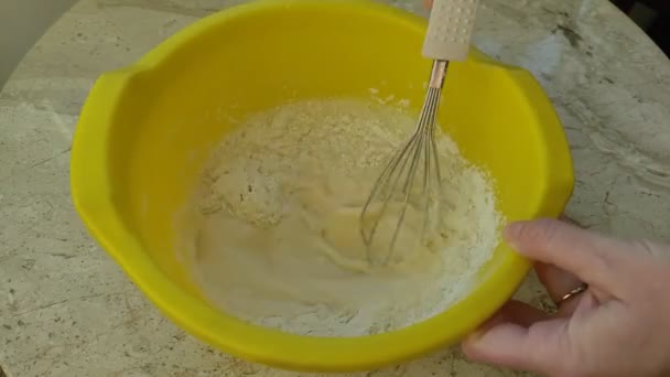 Chef Prepares Flour Pancake Dough Hand Whisking Yellow Bowl Whisk — Stock Video