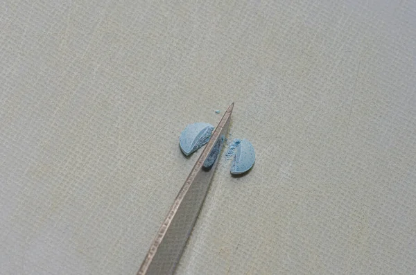 Patient Divides Pill Parts Knife Taking Treatment — Zdjęcie stockowe