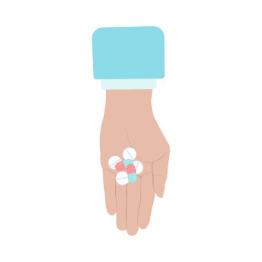 Doktor el ele tutuşan ilaç ve vitamin yığını