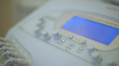 Elektriksel miyostimülasyon için aparat, alternatif tıp, yakın plan, odak kayması