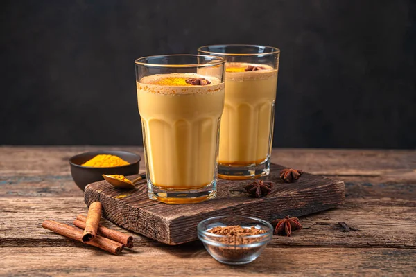 Two Glasses Coffee Milk Turmeric Wooden Background Healthy Drink Side Stock Image