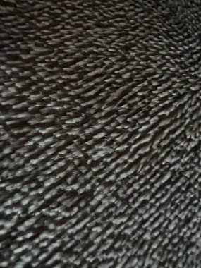 Uzun saçlı makro gri kumaş. Yüksek kalite fotoğraf