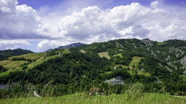 green hills of the Reggio Apennines, near Mount Ventasso province of REggio Emilia Italy. High quality photo clipart