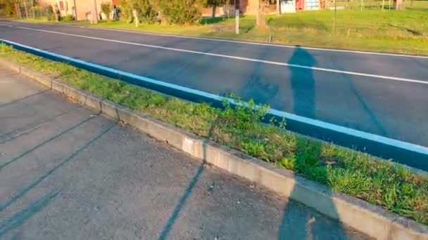 Passing Sunset Creates Long Shadows Road — Vídeo de Stock
