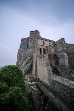 Sacra di San Michele in Turin, view from below of the cliff and walls. High quality photo