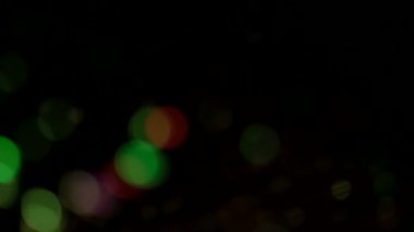 Işıkların ve optik liflerin koyu renk hareket arkaplanı