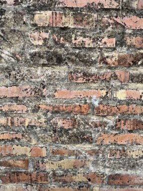 Güneşli bir günde eski taş duvar ve tuğla desenli arka plan. yüksek kaliteli fotoğraf