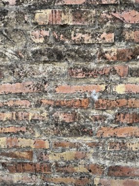 Güneşli bir günde eski taş duvar ve tuğla desenli arka plan. yüksek kaliteli fotoğraf