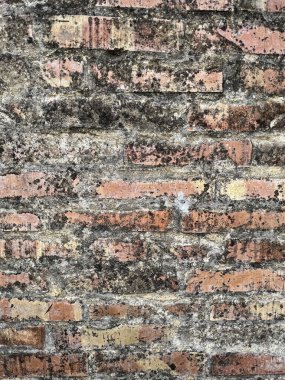 Güneşli bir günde eski taş duvar ve tuğla desenli arka plan. yüksek kaliteli fotoğraf