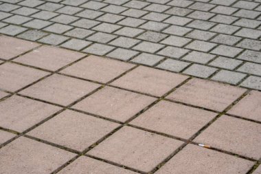 Kare beton, kendi kendine kilitlenen tuğla zemin. Yüksek kalite fotoğraf