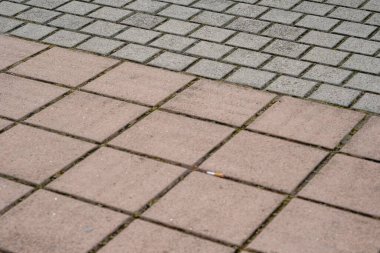 Kare beton, kendi kendine kilitlenen tuğla zemin. Yüksek kalite fotoğraf