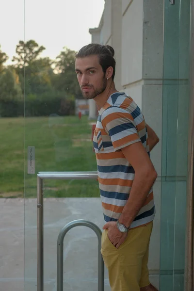 Beautiful Boy Strolls Bermuda Shorts Striped Shirt High Quality Photo — Stockfoto