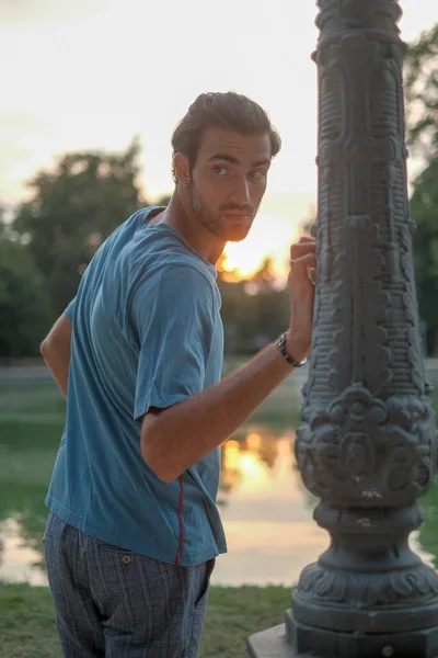 Handsome Italian Dark Haired Boy Leaning Pole Ducal Park Parma — Foto de Stock