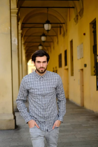 Handsome Dark Haired Italian Boy Strolls Arcades High Quality Photo — стоковое фото