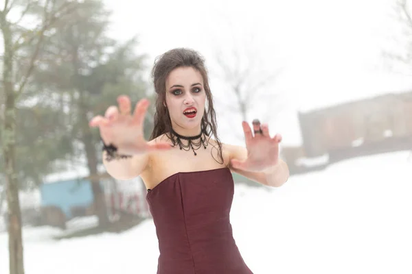 Beautiful Brunette Vampire Girl Blood Red Dress Walking Snow High — Stockfoto