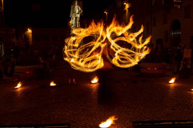 Reggio Emilia, Italy : 2013 09 14 public event in the square with fire-eating juggler High quality photo