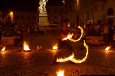 Reggio Emilia, Italy : 2013 09 14 public event in the square with fire-eating juggler High quality photo