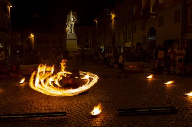 Reggio Emilia, Italy : 2013 09 14 public event in the square with fire-eating juggler High quality photo
