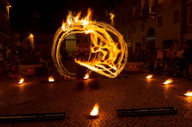 Reggio Emilia, Italy : 2013 09 14 public event in the square with fire-eating juggler High quality photo