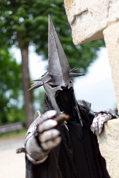 Nazgul warrior with helmet and sword from the lord of the rings. High quality photo