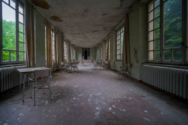 very long corridor in abandoned school orphanage hospital for young boys. High quality photo