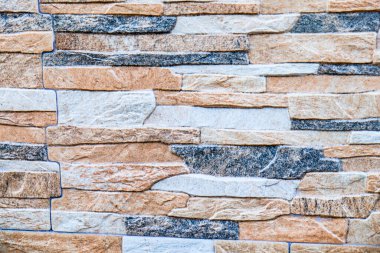 Renkli, taştan bir duvar. Yüksek kalite fotoğraf