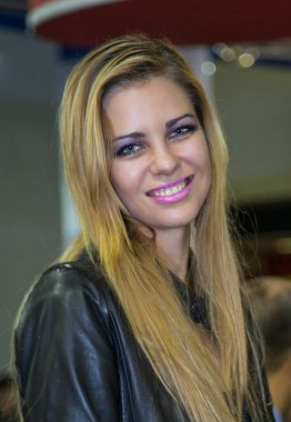 Milano, İtalya - 2012 10: Eicma Motor Bisiklet Etkinliği sarışın güzel kız. Yüksek kalite fotoğraf