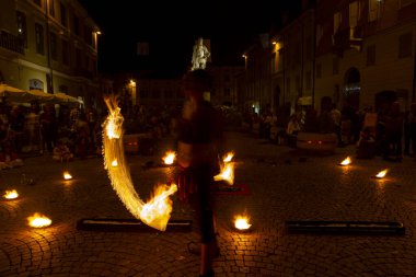 Reggio Emilia, Italy : 2013 09 14 public event in the square with fire-eating juggler High quality photo