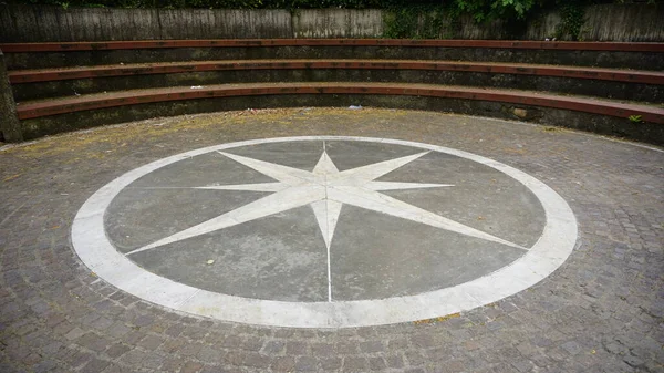 wind rose in the medieval historic center of the municipality of Marsciano Perugia. High quality photo