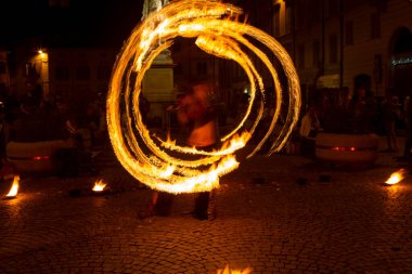 Reggio Emilia, Italy : 2013 09 14 public event in the square with fire-eating juggler High quality photo