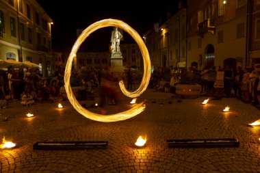 Reggio Emilia, Italy : 2013 09 14 public event in the square with fire-eating juggler High quality photo