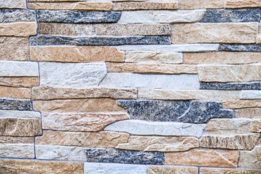 Renkli, taştan bir duvar. Yüksek kalite fotoğraf