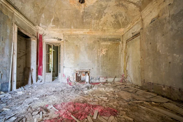 large living room with furniture and shelves in large abandoned house. High quality photo