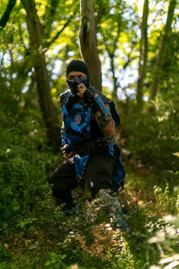 Lucca, Italy - 2018 10 31 : Lucca Comics free cosplay event around city fighter with musk subzero. High quality photo