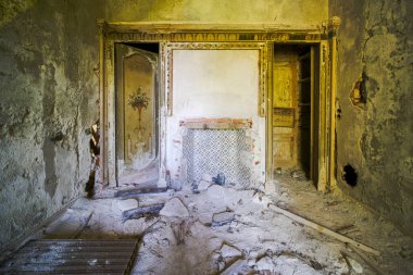 tired with wreckage and collapsed roof in abandoned house. High quality photo