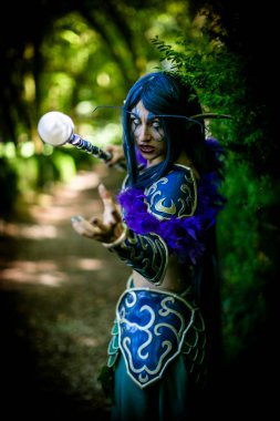 Lucca, Italy - 2018 10 31 : Lucca Comics free cosplay event around city warcraft Night Elf Girl . High quality photo