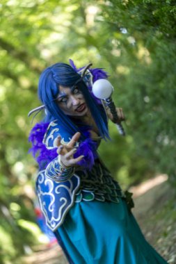Lucca, Italy - 2018 10 31 : Lucca Comics free cosplay event around city warcraft Night Elf Girl . High quality photo