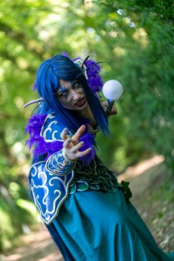 Lucca, Italy - 2018 10 31 : Lucca Comics free cosplay event around city warcraft Night Elf Girl . High quality photo