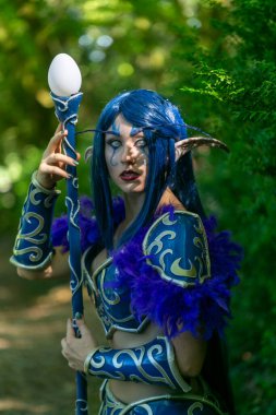 Lucca, Italy - 2018 10 31 : Lucca Comics free cosplay event around city warcraft Night Elf Girl . High quality photo